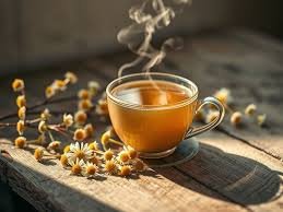 download (35) xícara de chá de camomila com flores ao redor