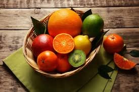 images Frutas cítricas frescas em cesta de palha representando saúde e imunidade