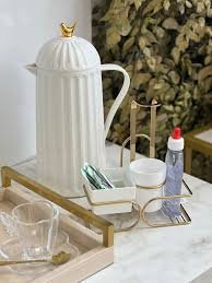 download (10) Xícara de café com diferentes tipos de adoçantes.