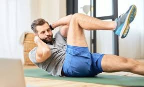 download (11) pessoa fazendo exercícios leves pela manhã em casa